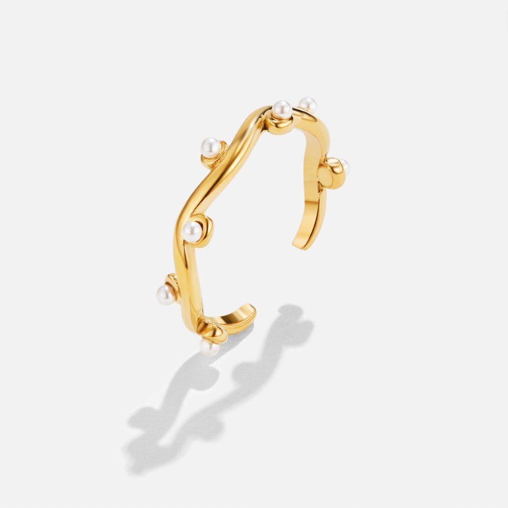 Platt ring med pärlor