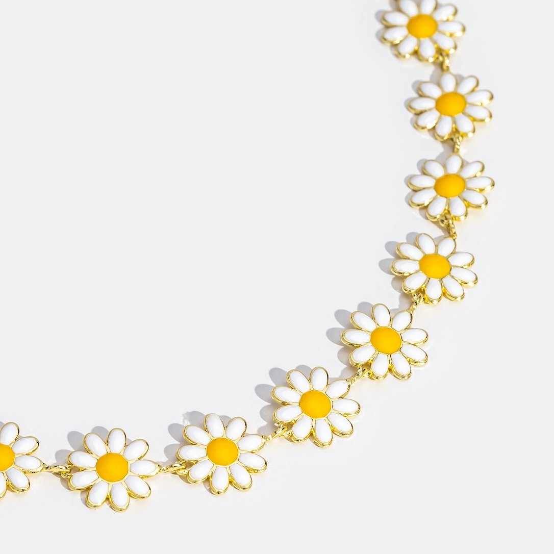 Halsband med tusensköna blommor